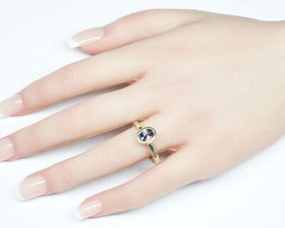 Schmuck aus zweiter Hand - 9k Gelbgold Fingerring mit einem Tansanit