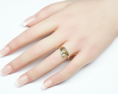Schmuck aus zweiter Hand - 18k Fingerring mit Topas