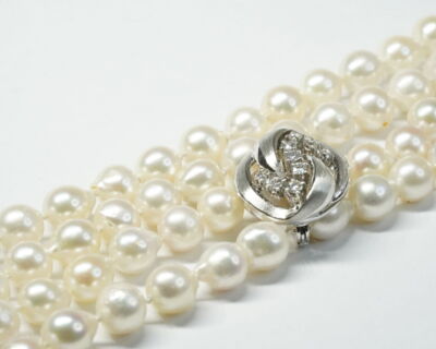 Second Hand Schmuck - Perlen Halskette mit Weissgoldklammer und Diamanten